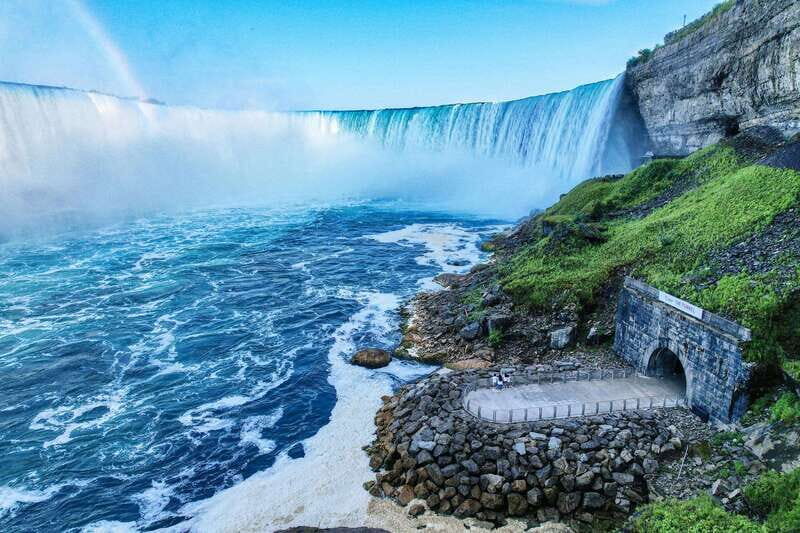 From Niagara Falls Canada Tour Boat, Lunch, Journey, Skylon - Niagara Parkway photo stops, Floral Clock, and Whirlpool Rapids views