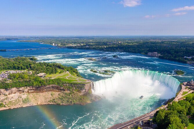 Niagara Falls Day Tour from Toronto with Boat Cruise and Lunch - Niagara Parkway sights: Floral Clock, Power Station, Whirlpool, and more
