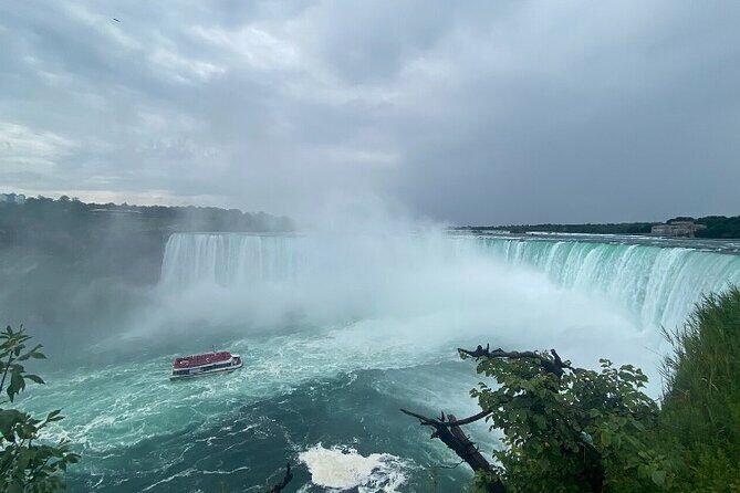 Niagara Falls Day Tour Includes Boat Cruise, Winery Stop & Lunch - Niagara City Cruises boat tour (summer) or Journey Behind the Falls (winter)
