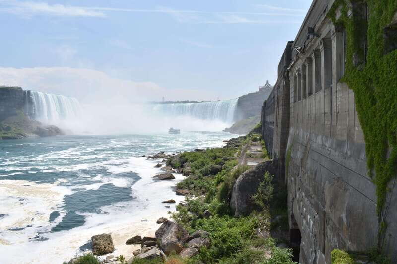 Niagara Falls Day Tour with Boat Ride & Journey Behind Falls - Niagara Parkway, Floral Clock, and Table Rock: finishing with postcard angles