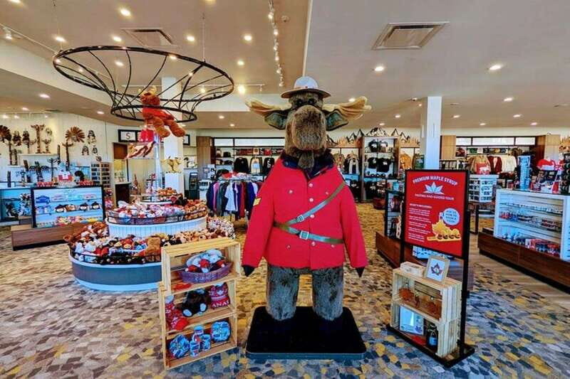 Toronto to Niagara Falls: Boat Ride & Behind the falls Tour - Stops that break up the day: floral clock, Niagara Whirlpool, and the scenic drive